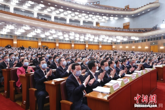 3月5日，十四届全国人大一次会议在北京人民大会堂开幕。中新社记者 盛佳鹏 摄